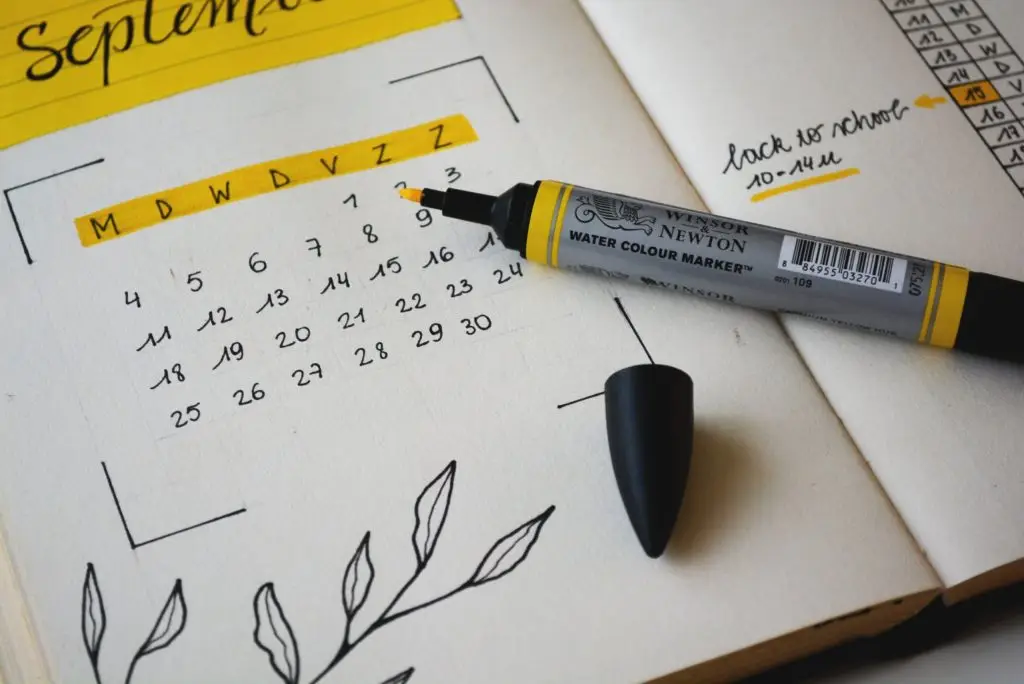 September calendar with yellow marker and notes
