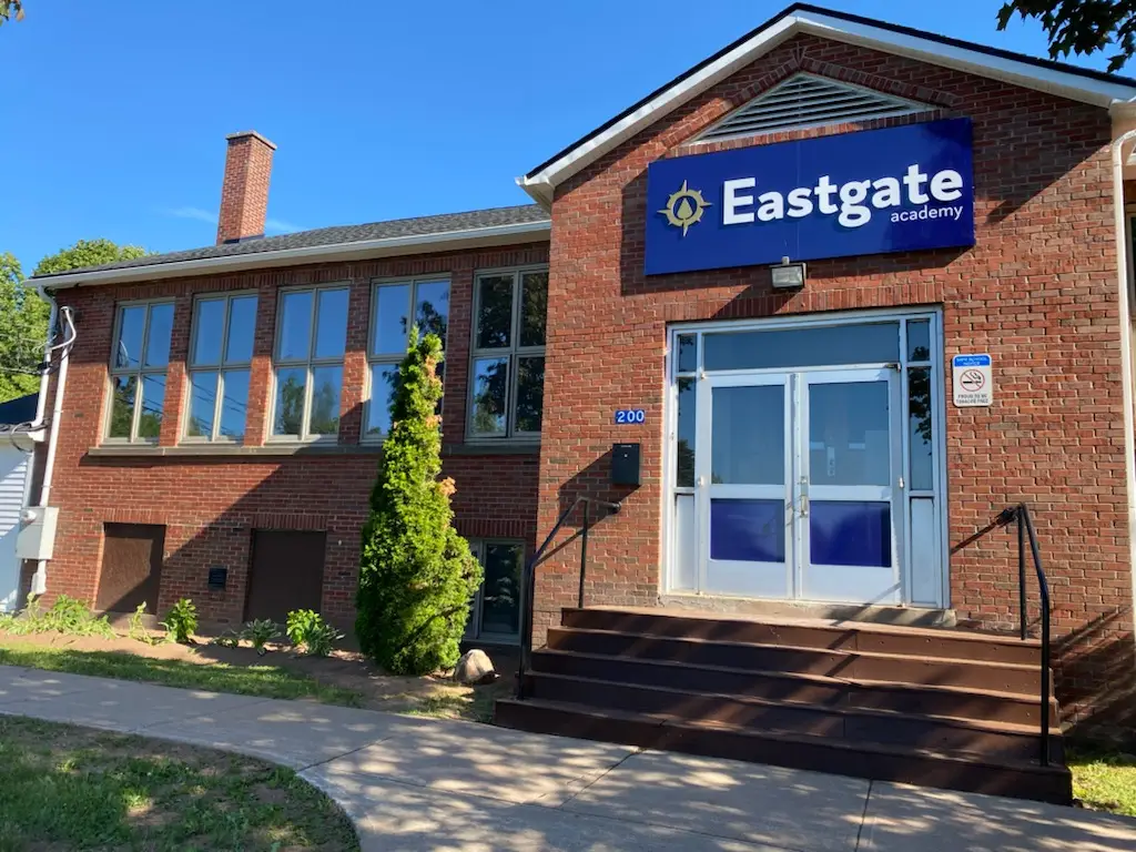 Eastgate Academy building entrance with blue sign.