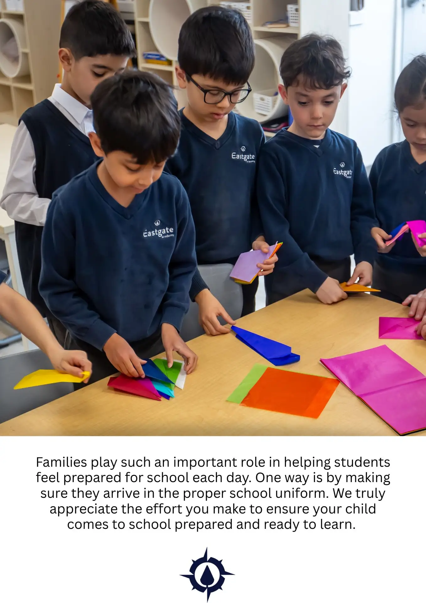 Children folding colorful paper in classroom activity.