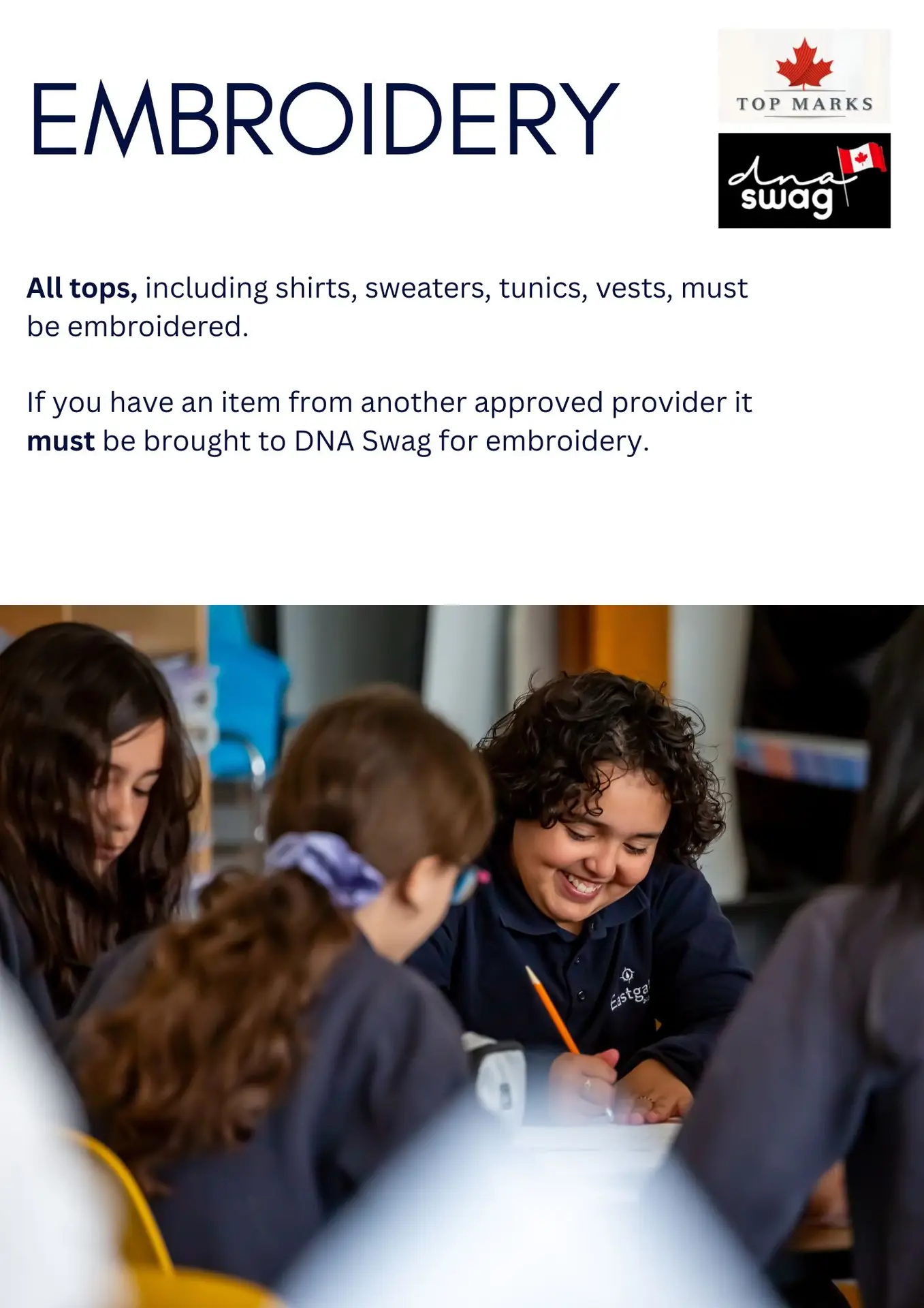Students wearing embroidered shirts writing notes together.